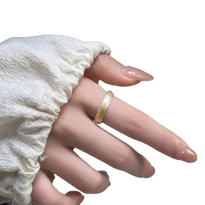 Adjustable open-mouth ring with geometric Xiangyun pattern in silver gold electroplated finish on white copper.