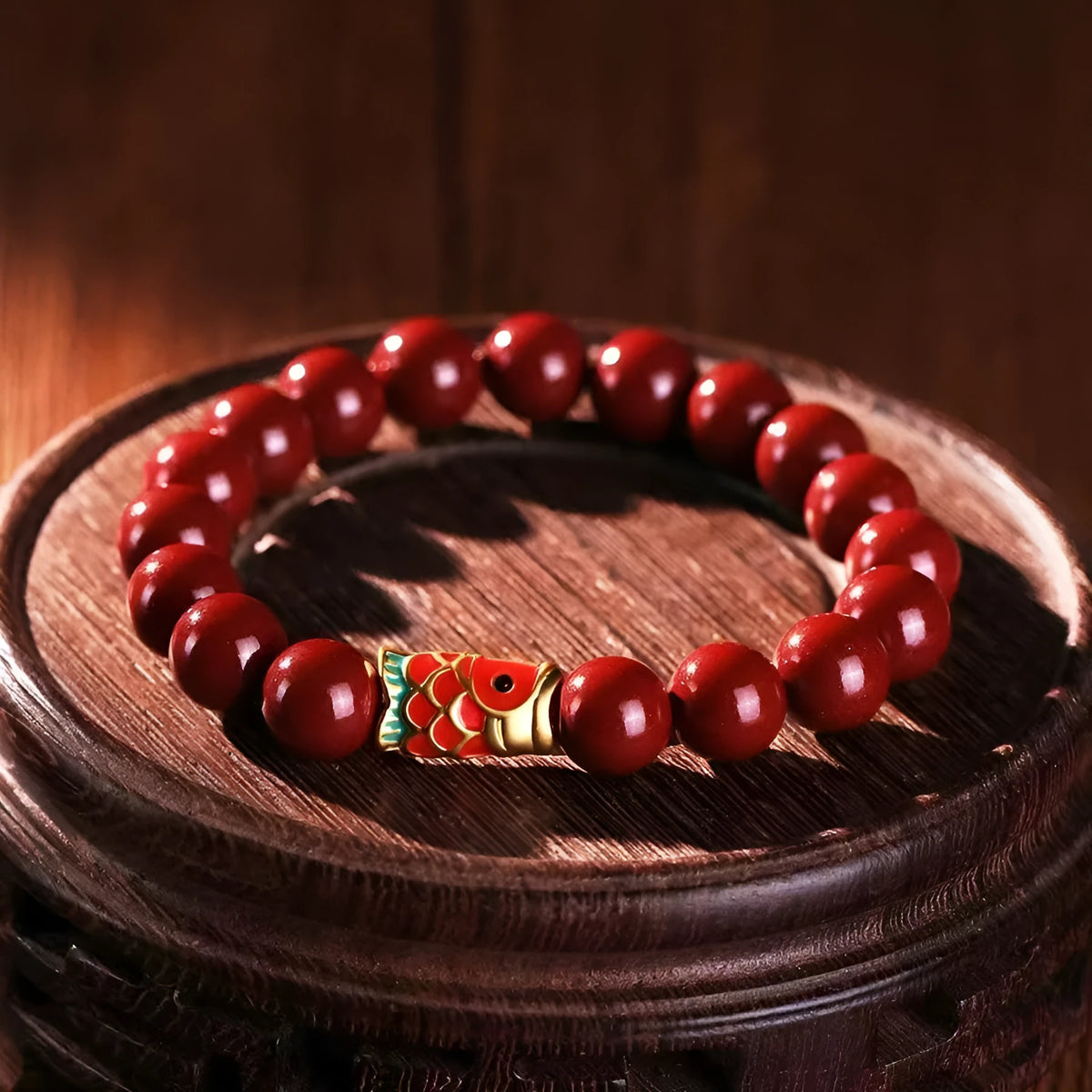 Handmade natural cinnabar bracelet with koi fish and golden ball charms in national style