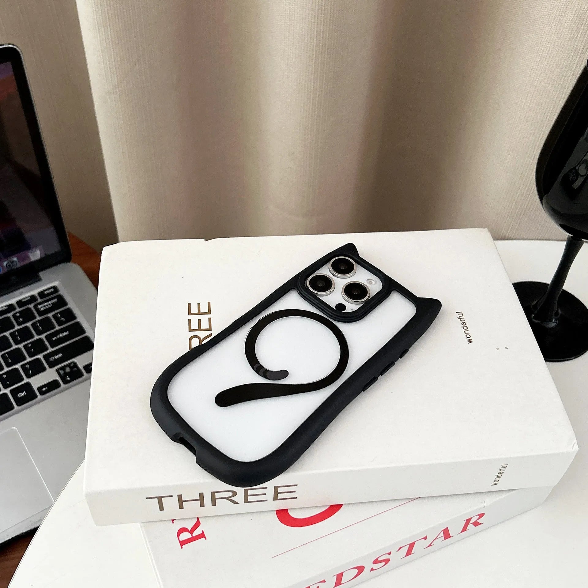 Transparent acrylic and TPU two-in-one phone case for iPhone 17 series in black, shown with magnetic function