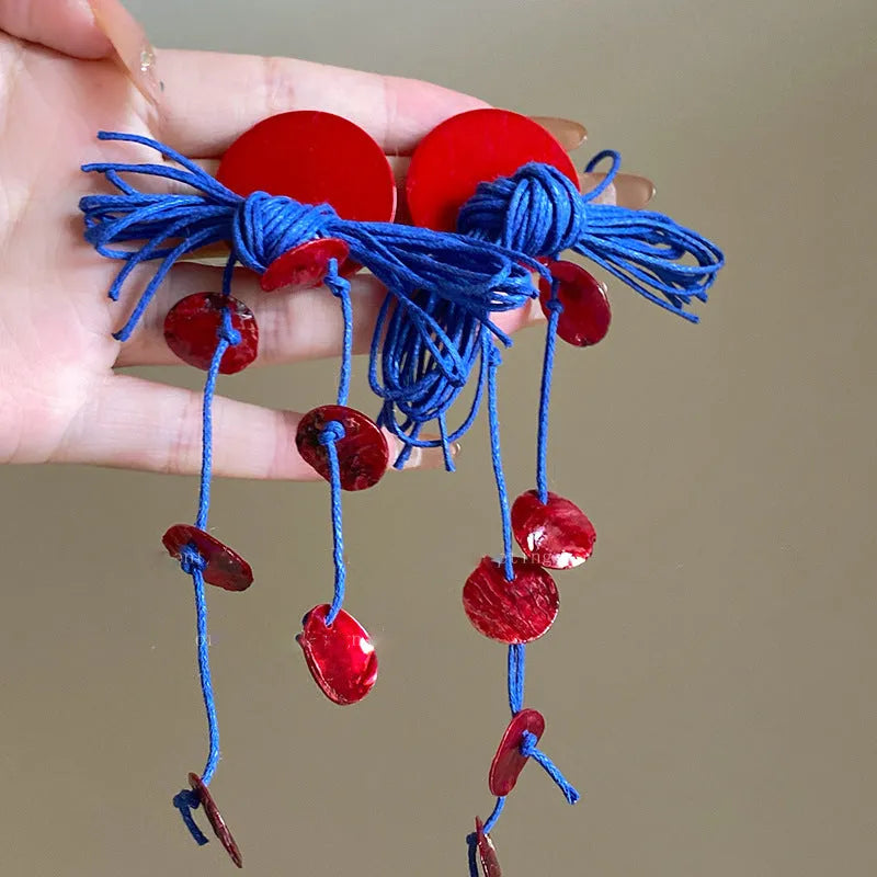 Women's geometric earrings with cloth base and silver needle-blue resin flower accents