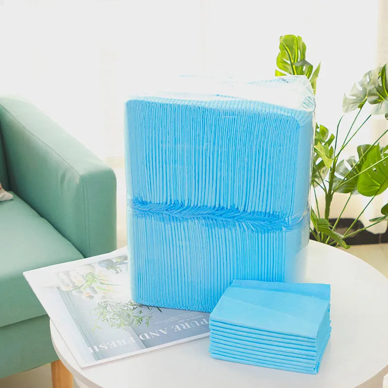 Pack of thick deodorant pet urinal pads for dogs and cats in various sizes.