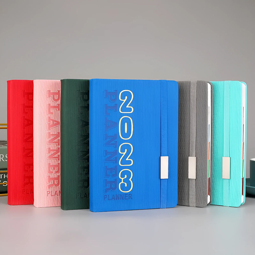 Student almanac calendar with imitation leather cover open to show Daolin paper pages