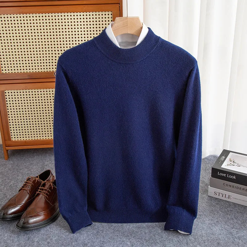 Man wearing a loose-fit half-collar wool sweater in a neutral colour for winter.