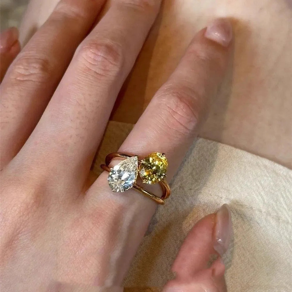 Water drop contrast colour open ring for women with geometric shape and double Sheng stone detail