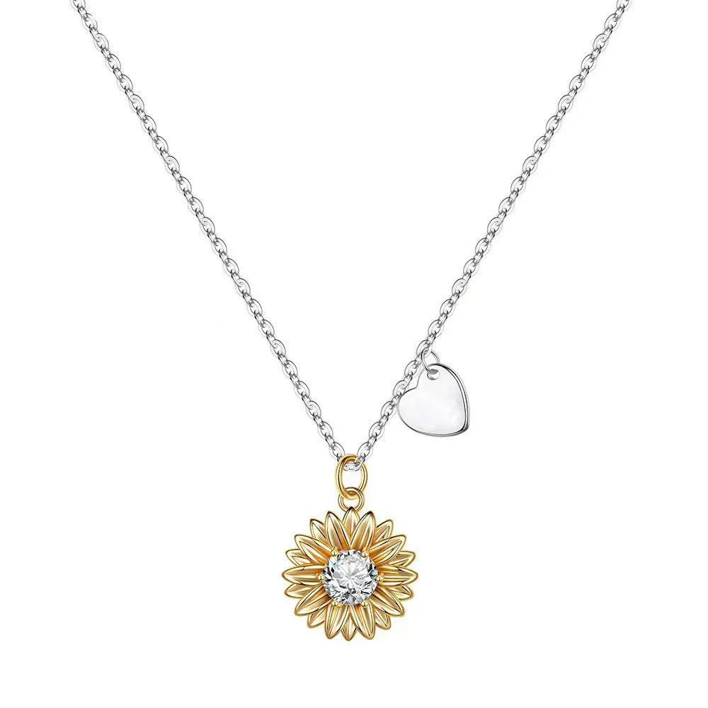 925 sterling silver sunflower daisy pendant on an adjustable cross chain necklace.