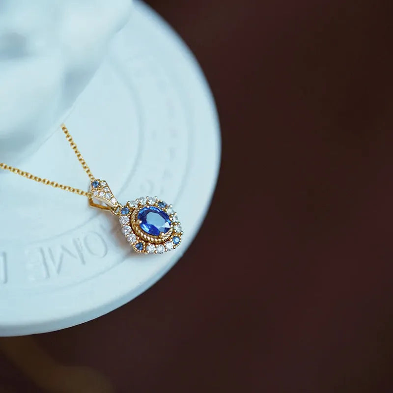 Women's royal necklace with mixed gem pendant on box chain in yellow gold colour