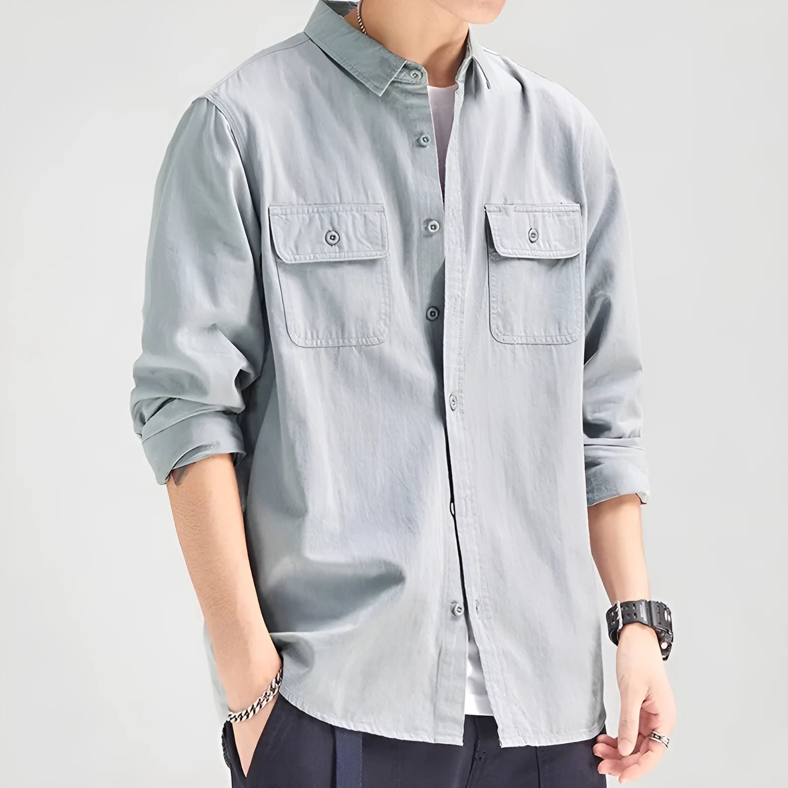 Men's loose-fitting long sleeve cardigan shirt in light grey, made from polyester fabric.
