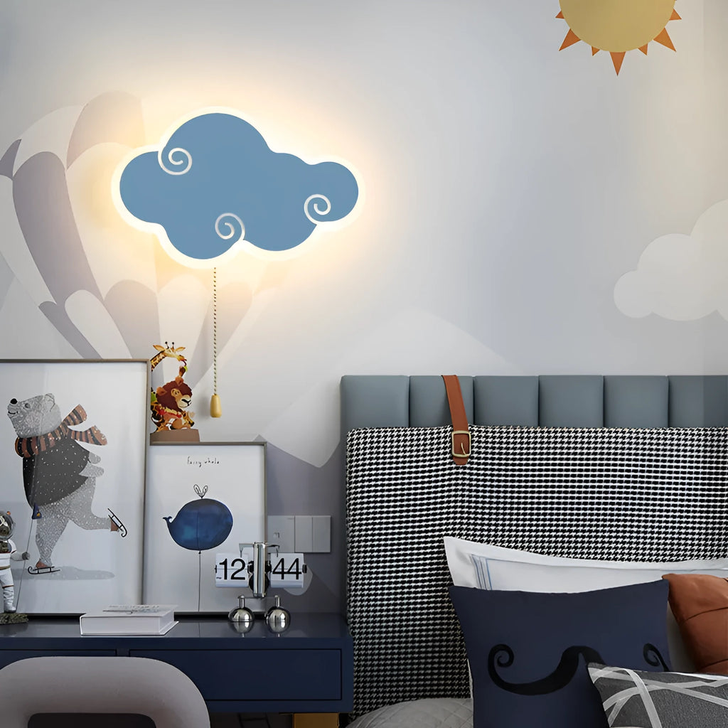 Modern cloud-shaped children's wall lamp with acrylic shade in blue colour option mounted on a wall.