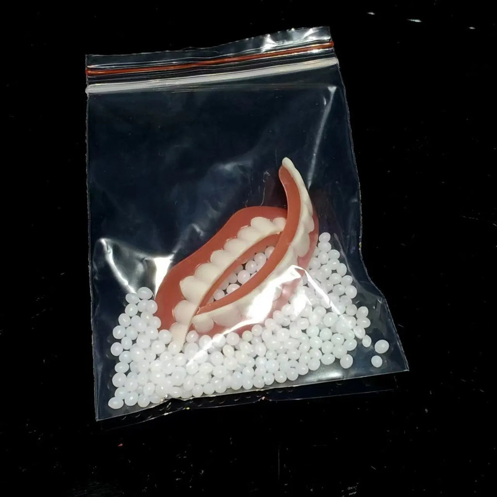 Silicone simulation smile dentures in colour box packaging for dental training