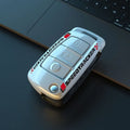 Carbon fibre style car key cover with mirror surface detail in carbon black colour