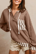 Straw yellow hoodie with waffle texture fabric and striped patchwork panels, button neck and drawstring waist