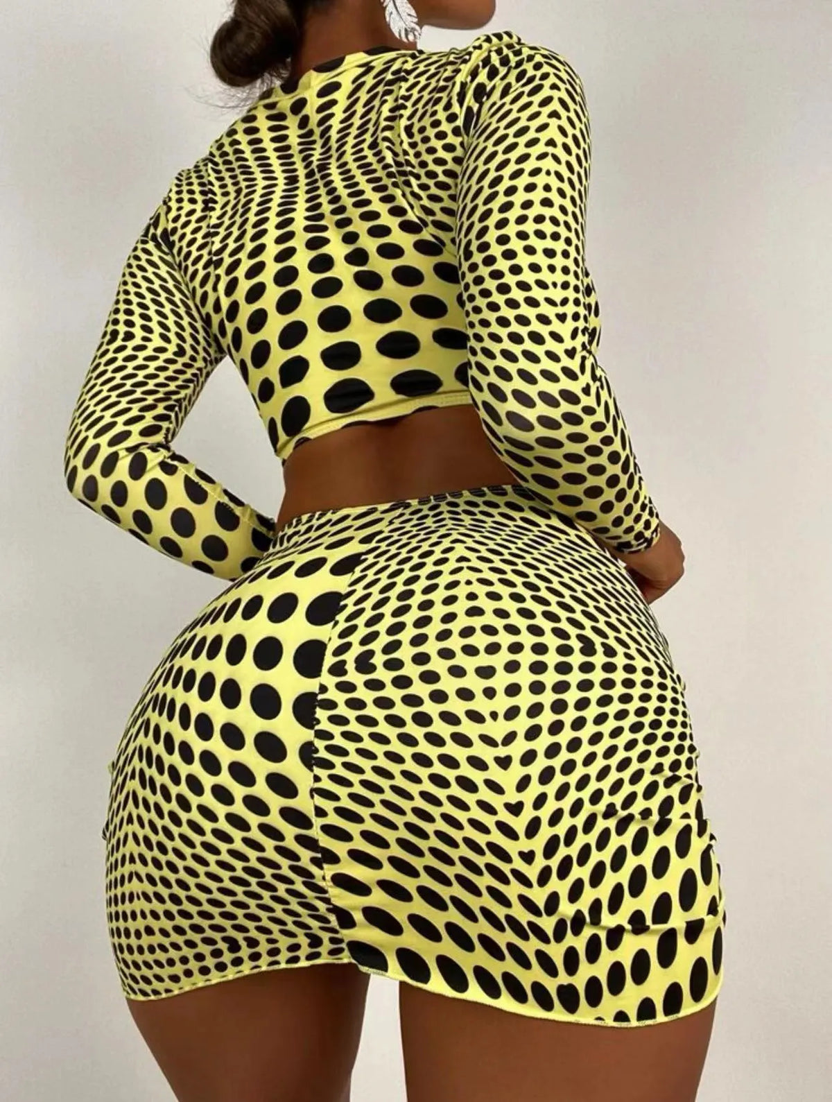 Women's polka dot swimsuit three-piece set in green colour with bra, top, and skirt