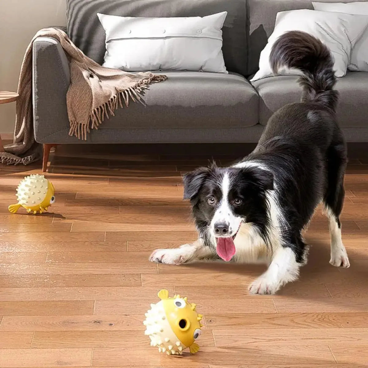 Yellow fish-shaped durable vinyl dog chew toy with textured surface for dental care.