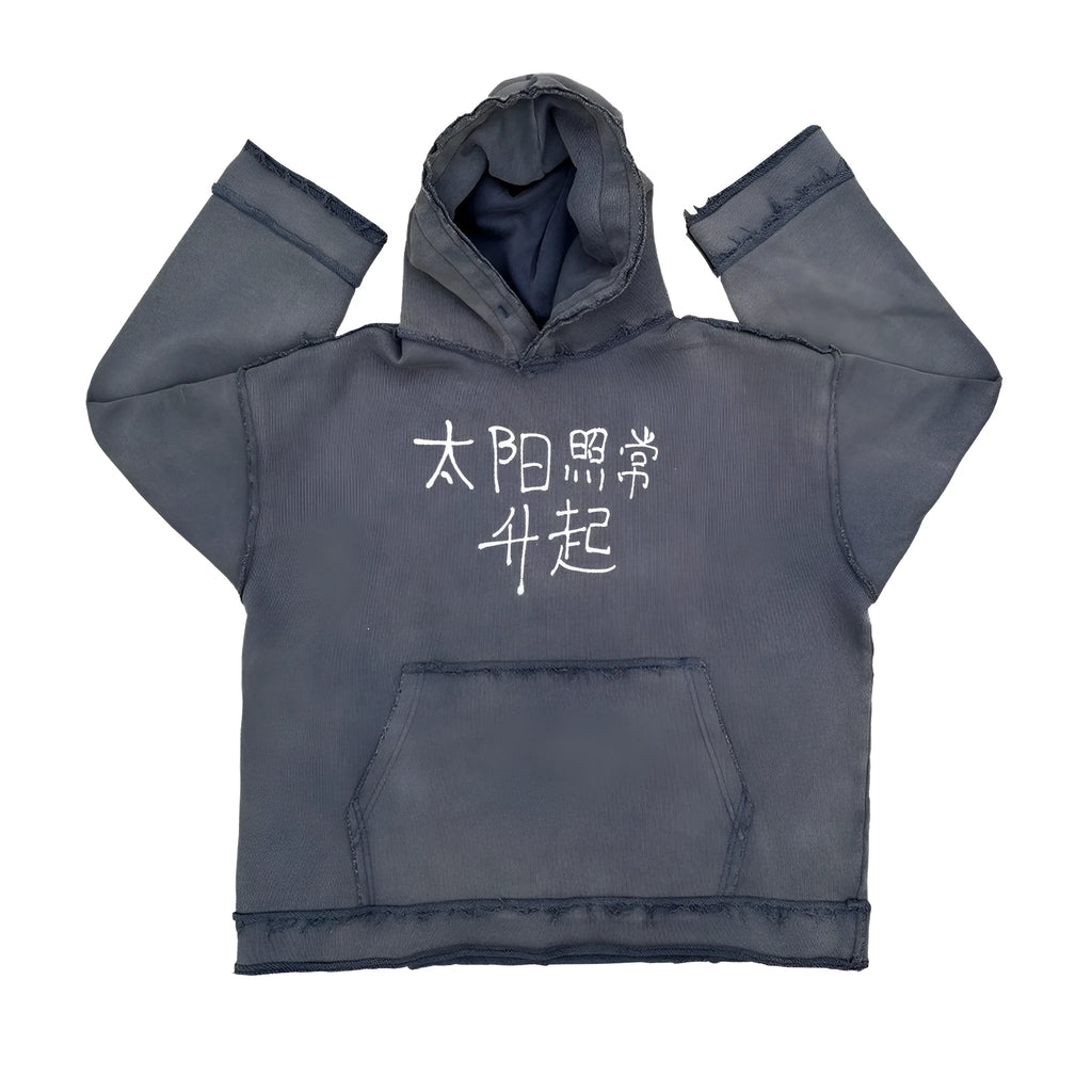 A dark blue oversized cotton blend hoodie sweatshirt with a fleece lining, shown on a hanger.