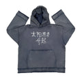 A dark blue oversized cotton blend hoodie sweatshirt with a fleece lining, shown on a hanger.