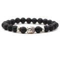 A stretch bracelet made of 8mm natural stone beads including Tigereye and turquoise, with a 19cm circumference.