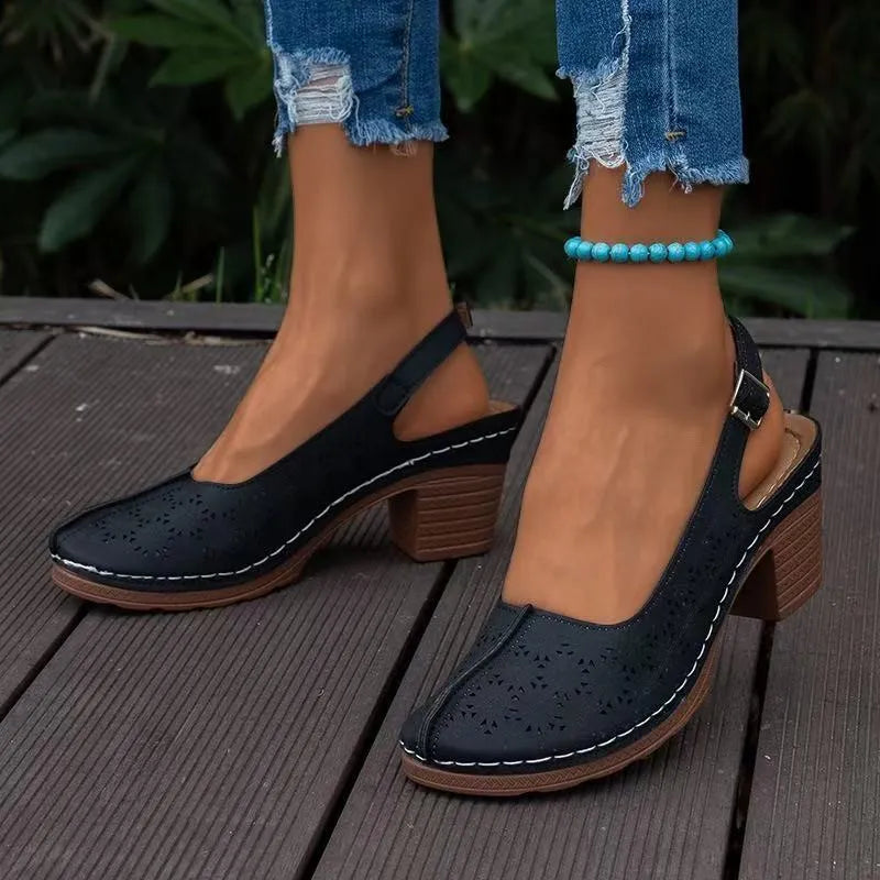 Women's black closed toe wedge sandals with round toe and rubber sole