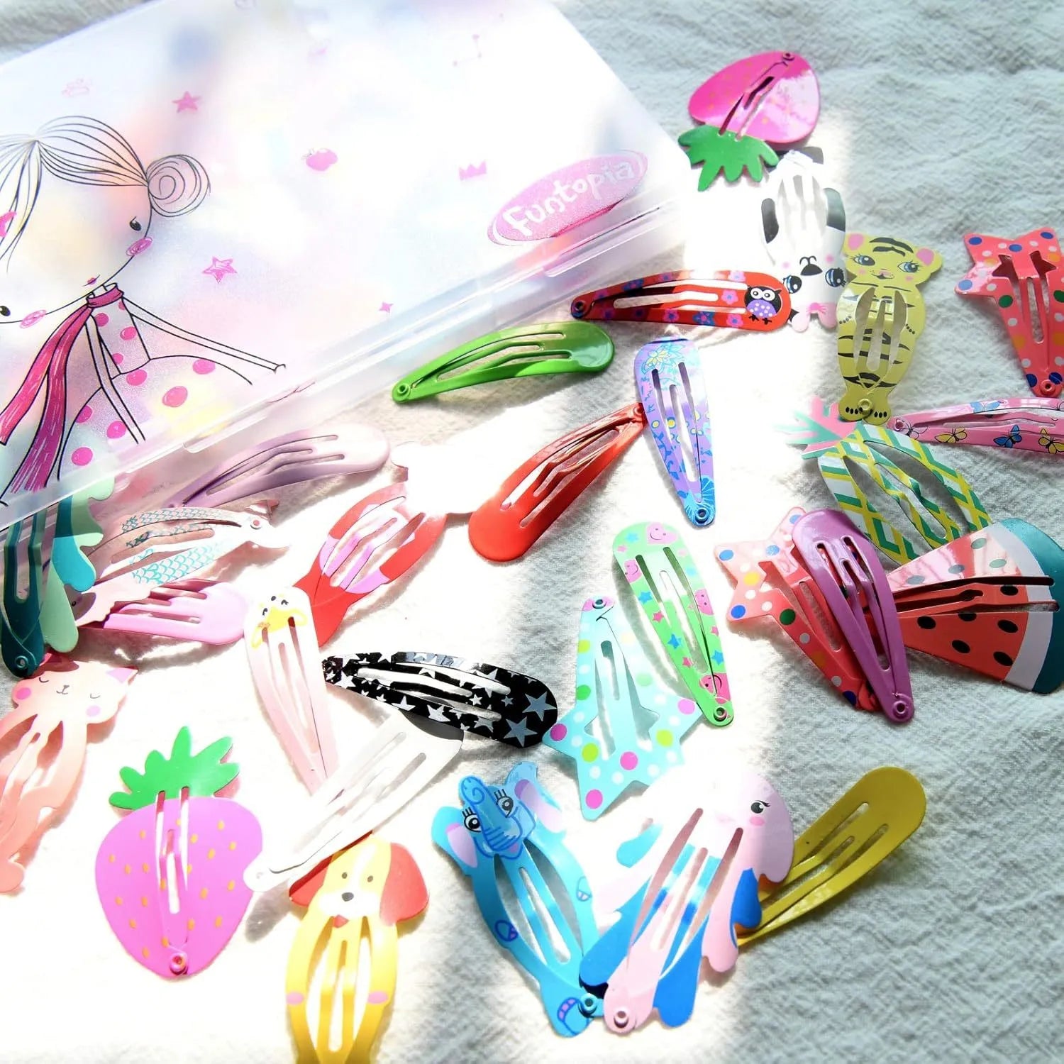 100 piece metal snap hair clips for girls in candy colours with animal, fruit, crown, star, and flower designs
