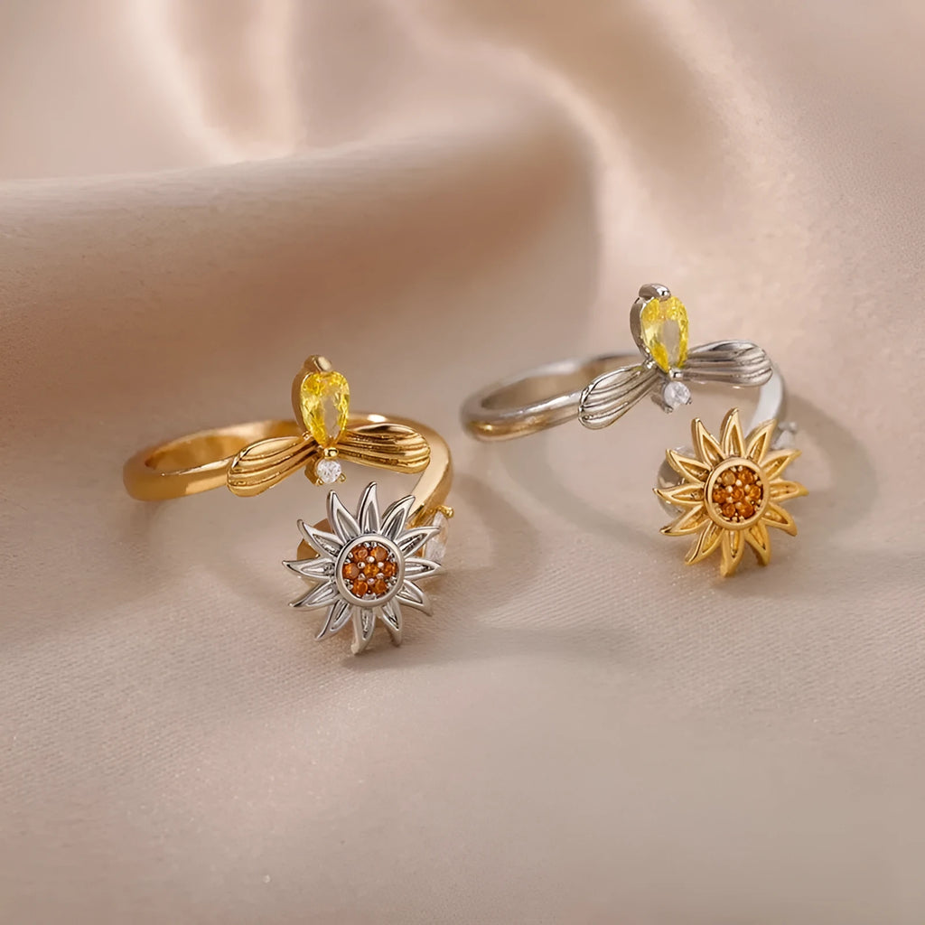 Geometric decompression ring with adjustable opening in gold or platinum colour