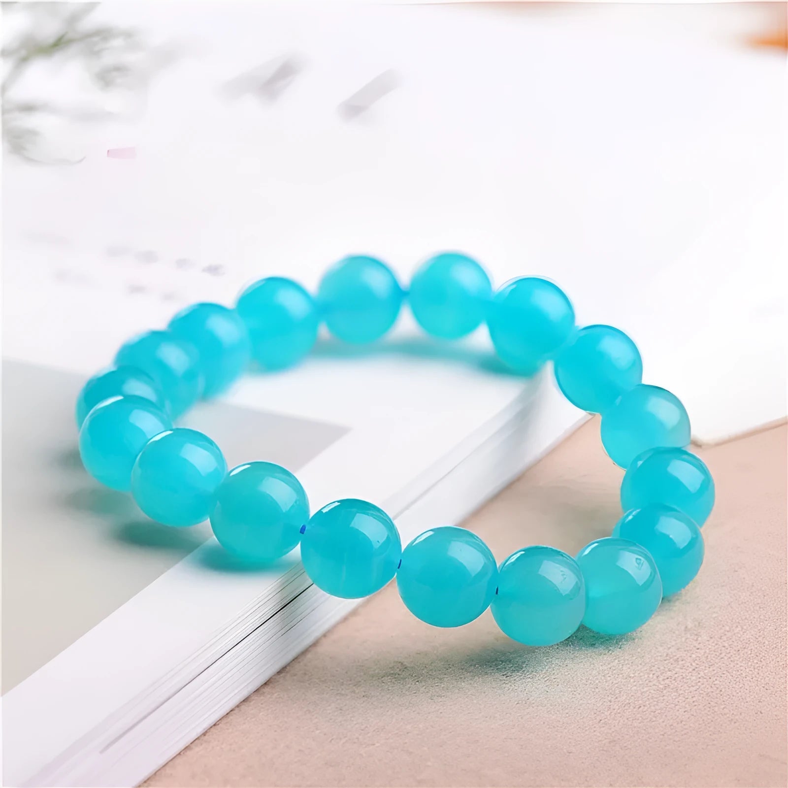 Natural Grade 7A Amazonite scattered beads showing 5A Ice and 7A Ice colour options in various sizes from 6mm to 13mm.