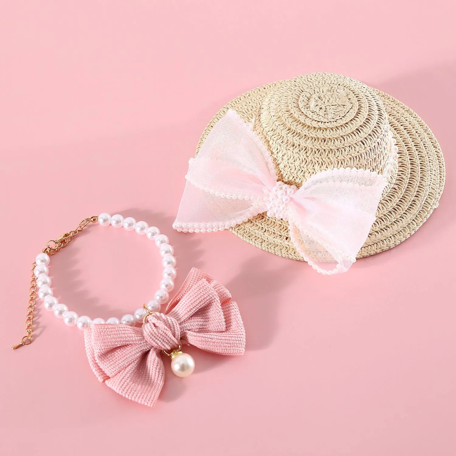 Woven Lafite leaf cat hat with pearl bow decoration in butterfly design