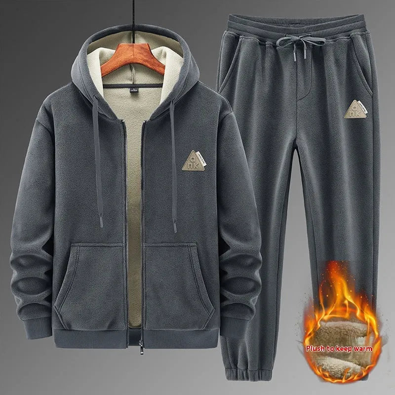 Casual sports suit consisting of a grey cashmere hooded sweater and matching cotton trousers.