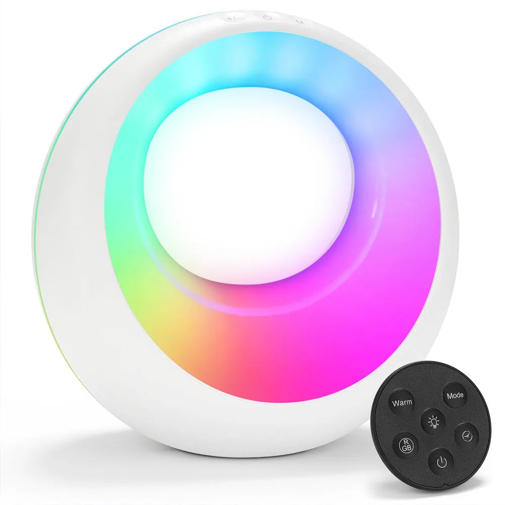 Small white desk lamp with remote control showing RGB colour changing ambient light display