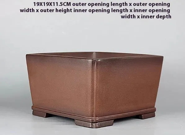 Handmade brown antique style purple clay flower pot measuring 19x19 cm
