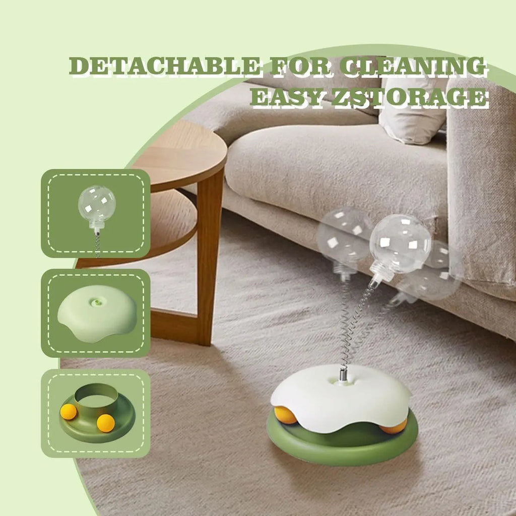 Blue and green interactive cat treat dispenser toy with track ball, measuring 21.5 by 32 cm.