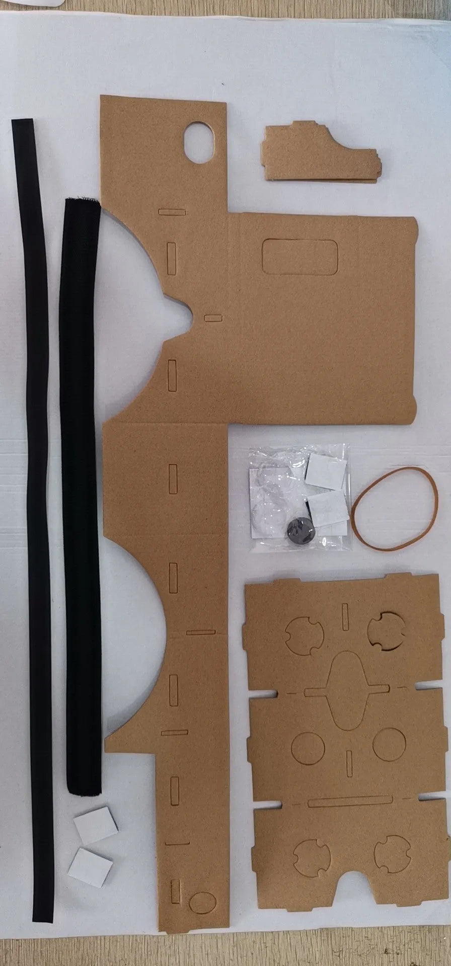 Cardboard VR glasses for smartphones with 3D lenses, showing pink colour option