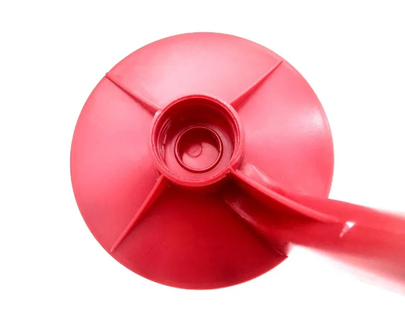 Red Magic Tap soda dispenser attached to 2-litre bottle with push-in mechanism for drink serving