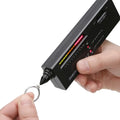 Black portable thermal conductivity meter for diamond testing with metal probe, showing dimensions.