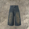 Cropped men's denim shorts with flame embroidery patch in straight-leg cut for summer street style