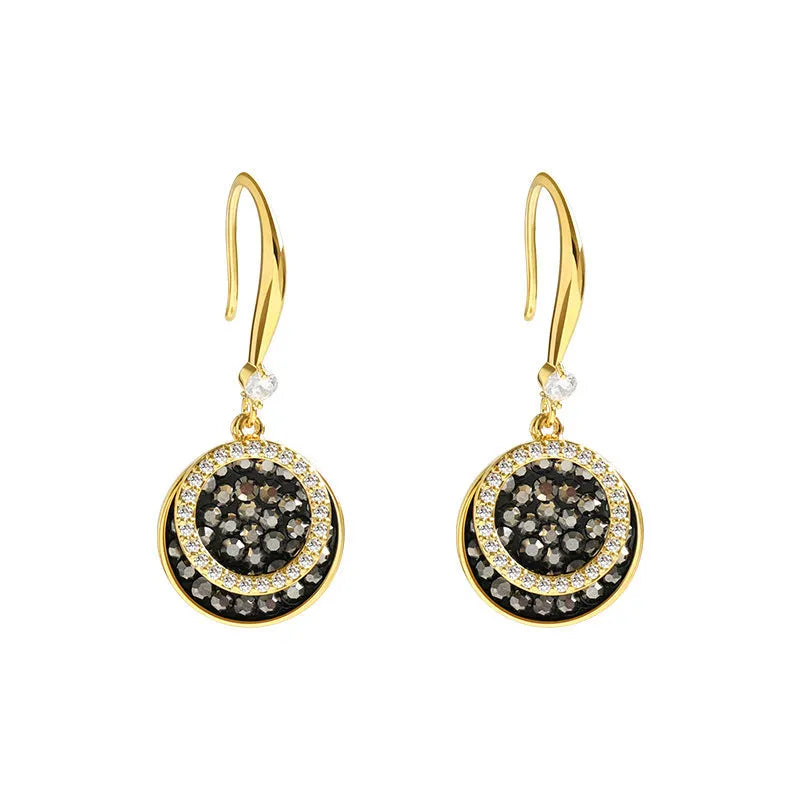 Black geometric alloy earrings with round piece in retro Hong Kong style, 3.6cm long.