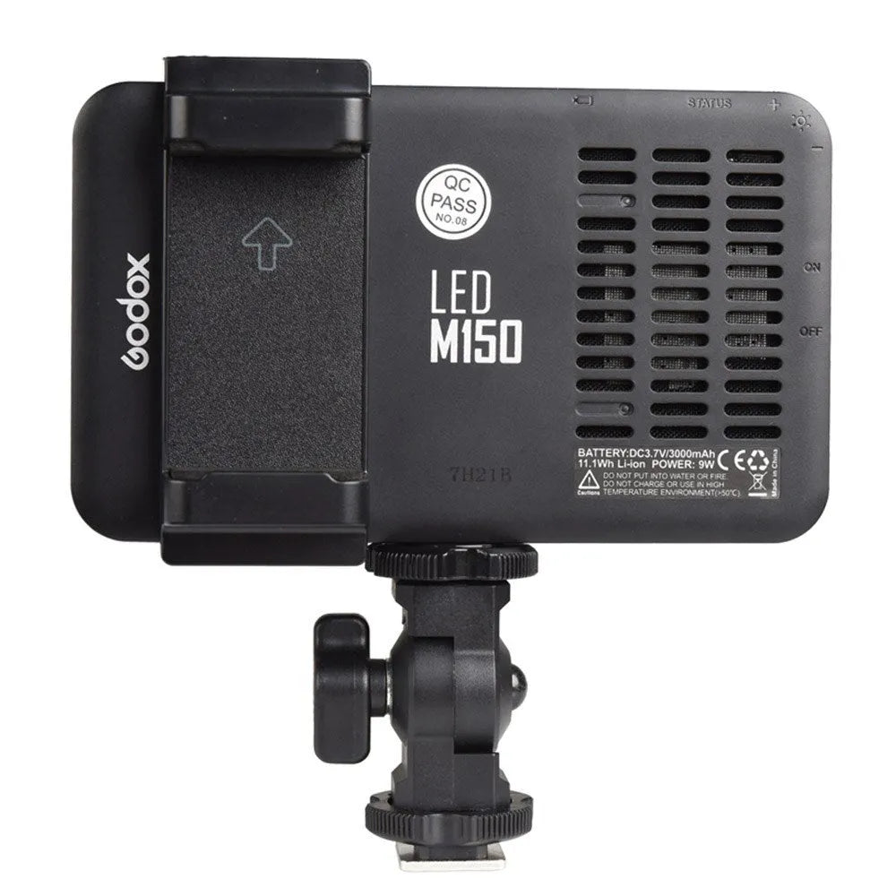 Shenniu M150 ultra-thin silver aluminium LED video light mounted on a mobile phone.