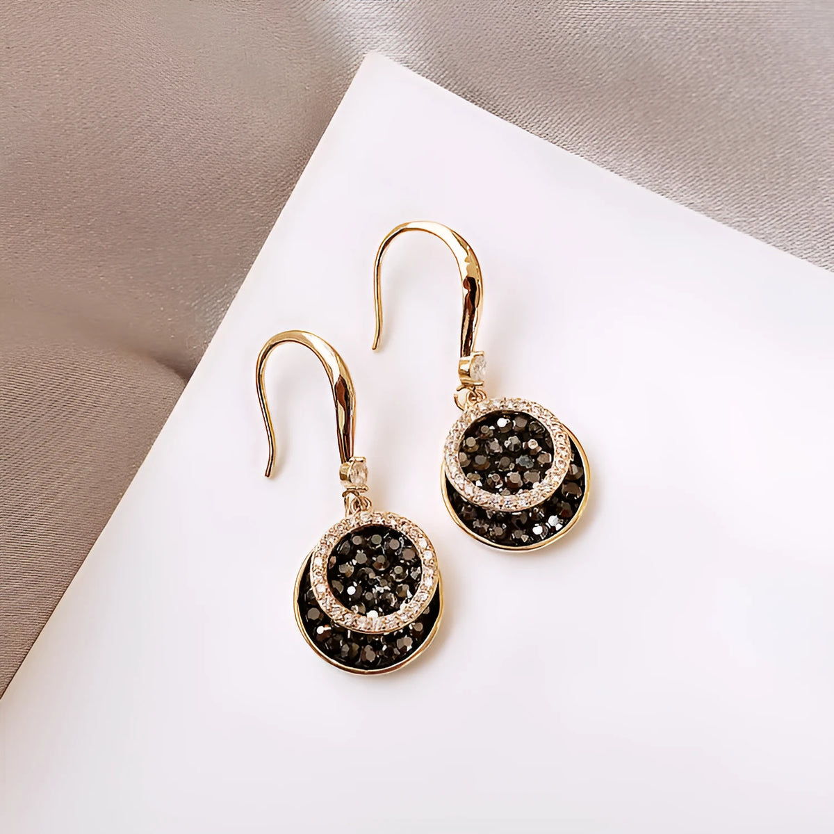 Black geometric alloy earrings with round piece in retro Hong Kong style, 3.6cm long.