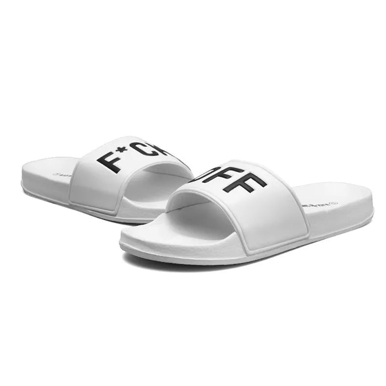 Large size men's black open toe slippers with a rubber sole, shown from the side.