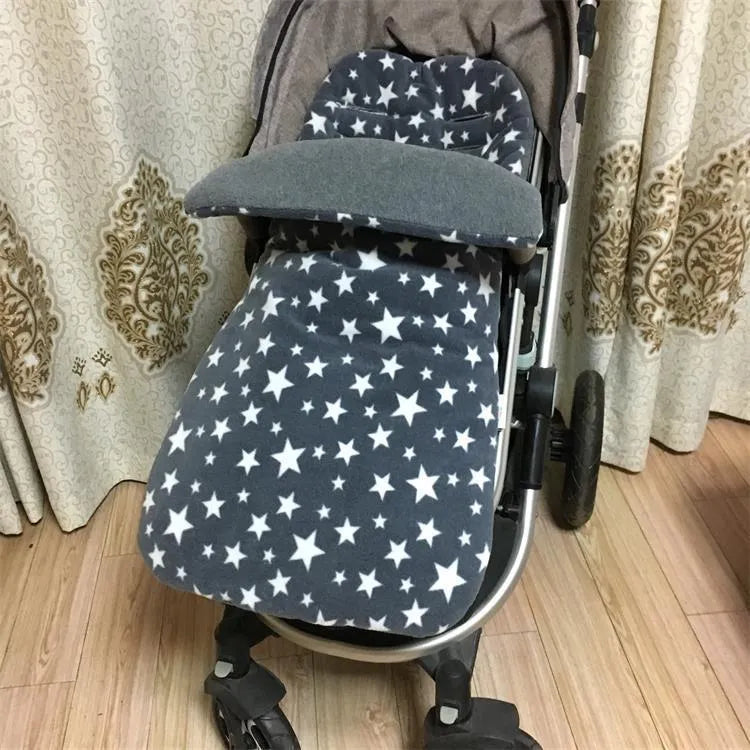 Envelope-style baby stroller sleeping bag in beige colour showing thick cotton wool filling and soft lining.