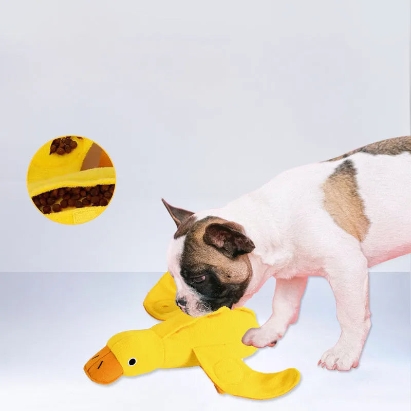 Yellow plush teddy dog toy with a duck squeaker and hidden treat pockets for training and chewing