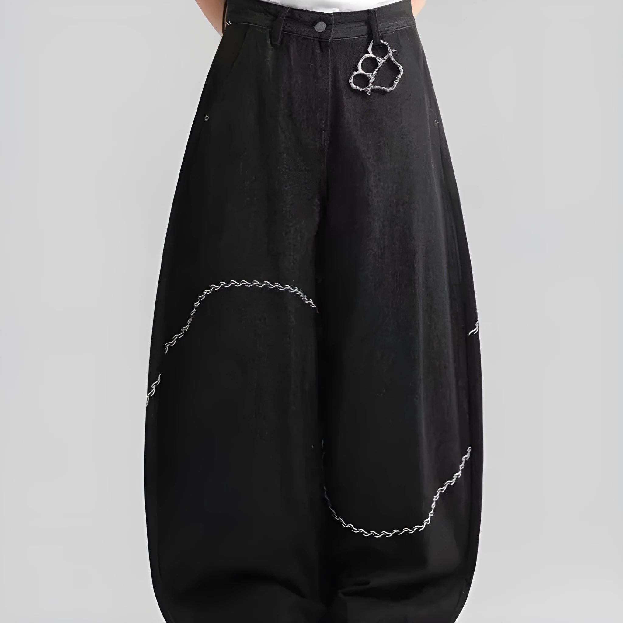 Black straight-leg denim trousers with mid waist and zip fly on mannequin