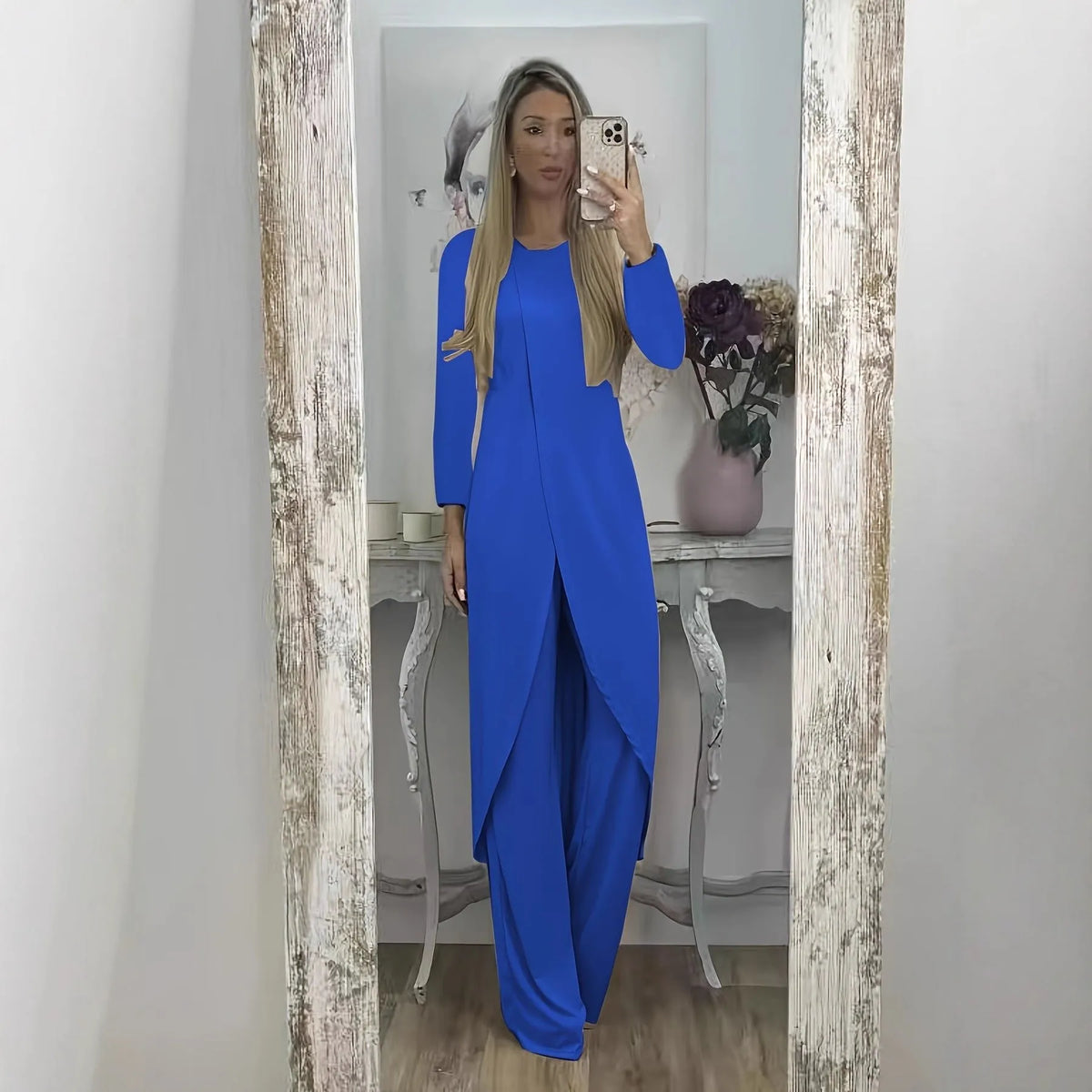 Casual black polyester two-piece tracksuit set with long sleeves and loose-fit trousers.