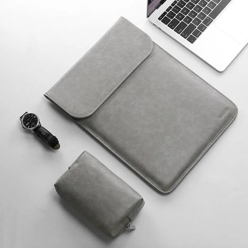 Fleece flanged laptop liner pack in black, green, grey, or pink, 11 to 15.6 inch size options