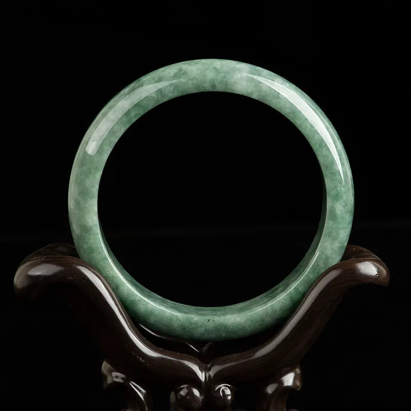 Natural dark pea green jade beaded bracelet for women, shown with gift box.