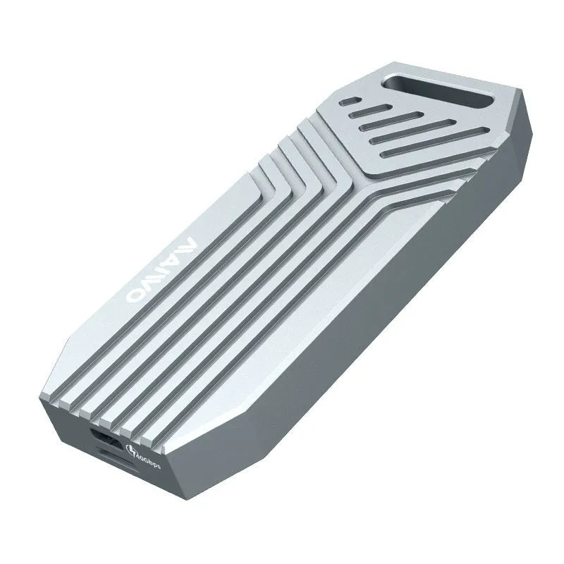Silver aluminium Thunderbolt 4 external SSD enclosure for M.2 drives with a cooling fan on a desk