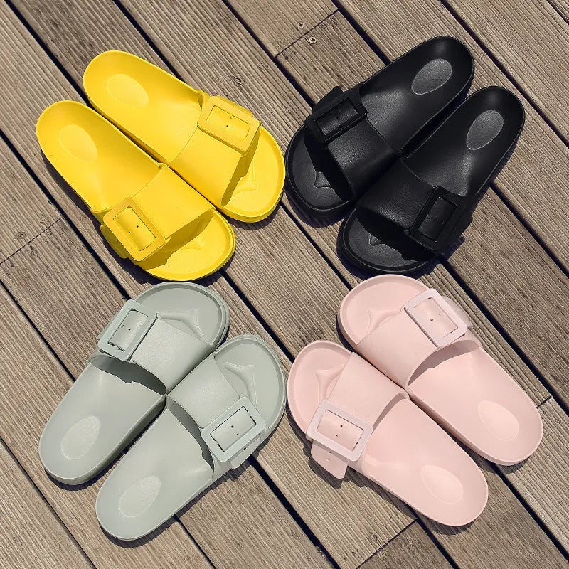 Women's grey blue buckle flip-flop with soft EVA sole and adjustable strap.