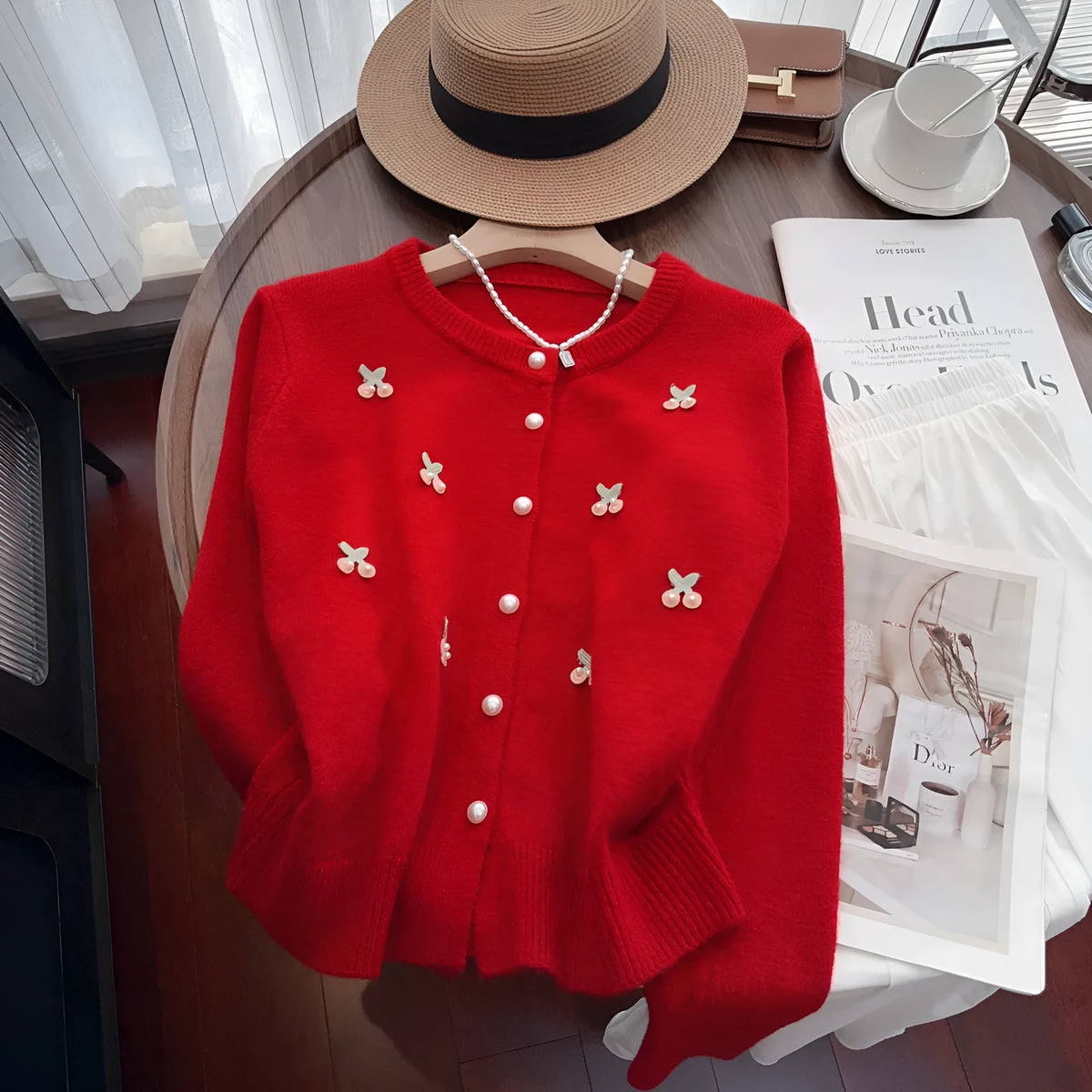 Women's slim fit cashmere-feel cardigan with beaded detail on sleeve, in blue colour.