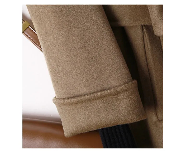 A long caramel-coloured wool coat for men with a formal suit-style collar laid flat.