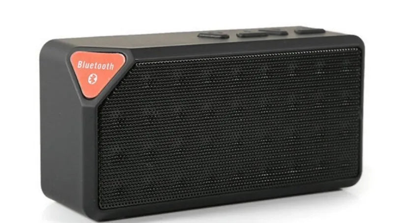 Cannon X3 small cube-shaped portable Bluetooth speaker in black, blue, green, red, and yellow colour options