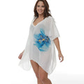 White plus size beach cover-up blouse with loose fit for sun protection over swimwear