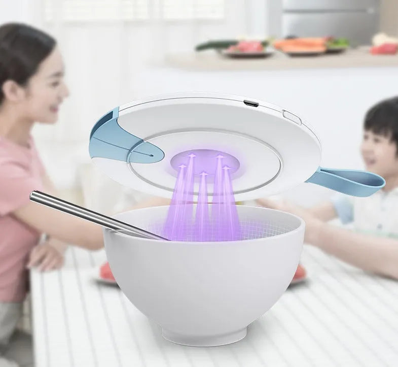 Portable UV-C baby bottle steriliser in blue with USB charging cable and compact travel size